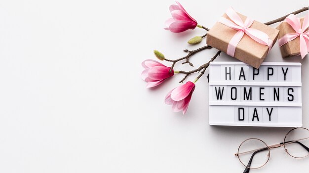 Happy women's day lettering on white background with copy space