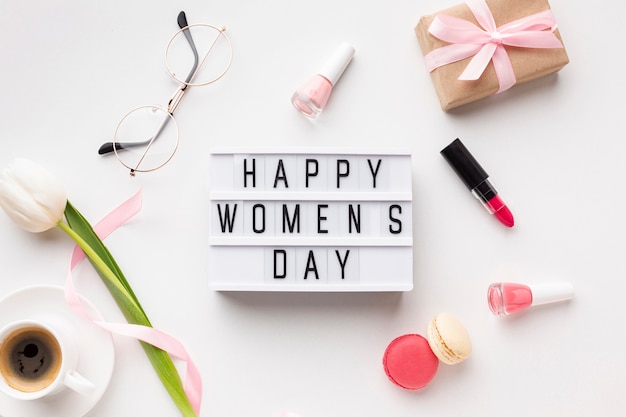 Happy women's day lettering on white background