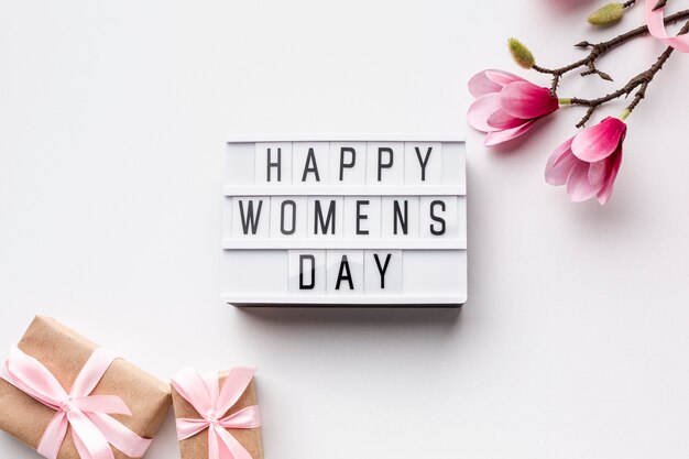 Happy women's day lettering on white background