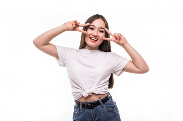 Happy young asian woman showing two fingers