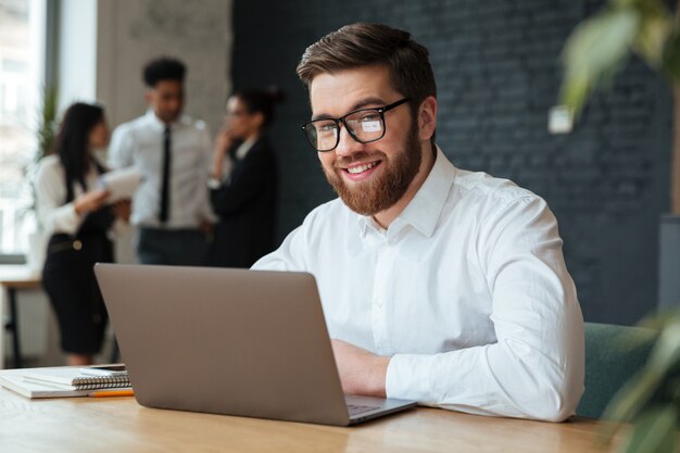 Happy young caucasian businessman