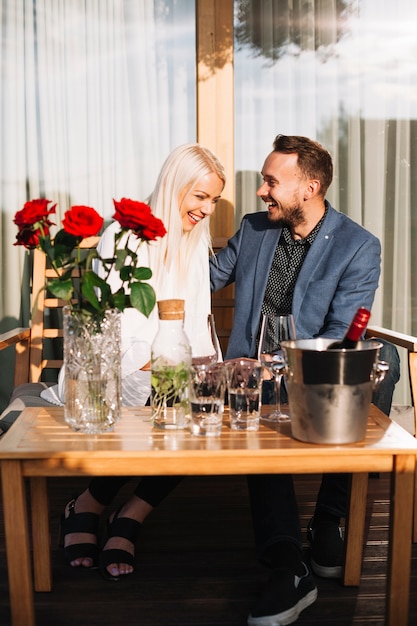 Happy young couple enjoying in the restaurant