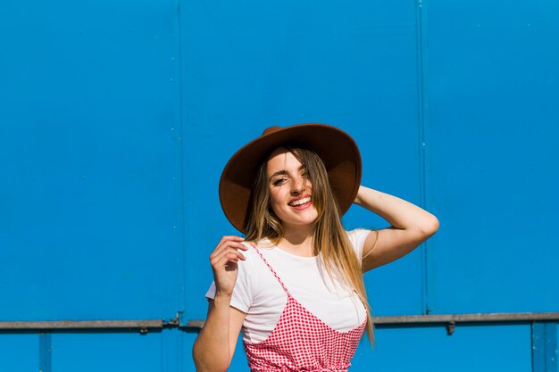 Happy young girl in the amusement park