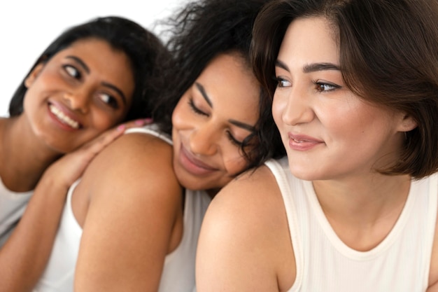 Happy young girlfriends close up