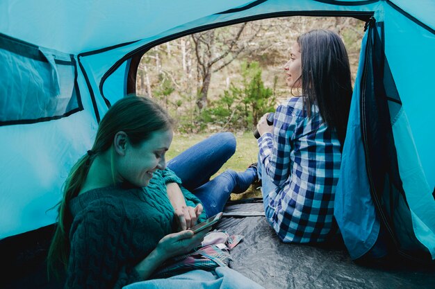 Happy young girls in the tent