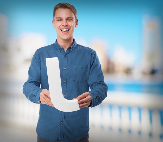 happy young man with j letter