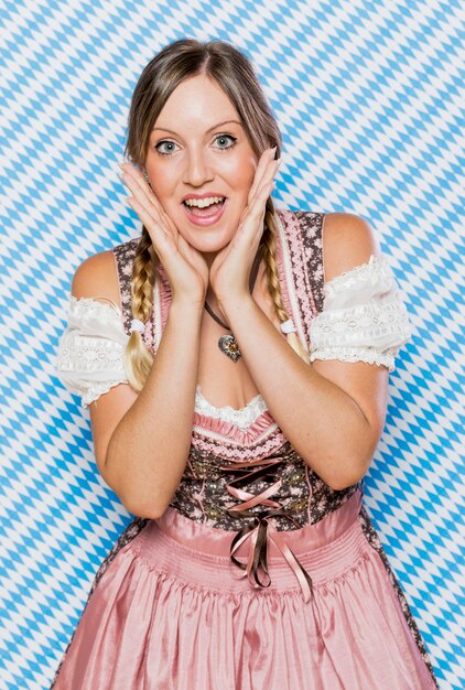 Happy young woman in traditional dress