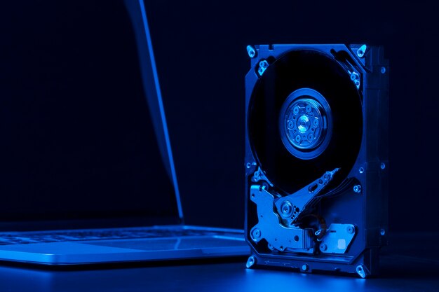 Hard drive with blue light and laptop arrangement