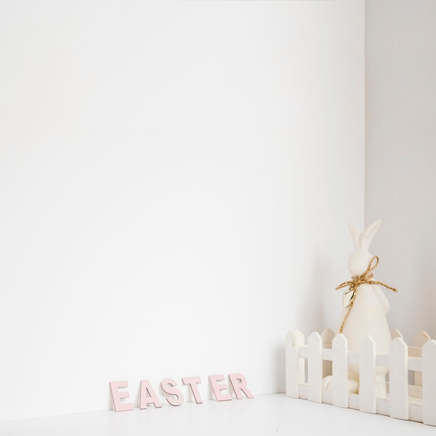 Hare in fence and Easter word