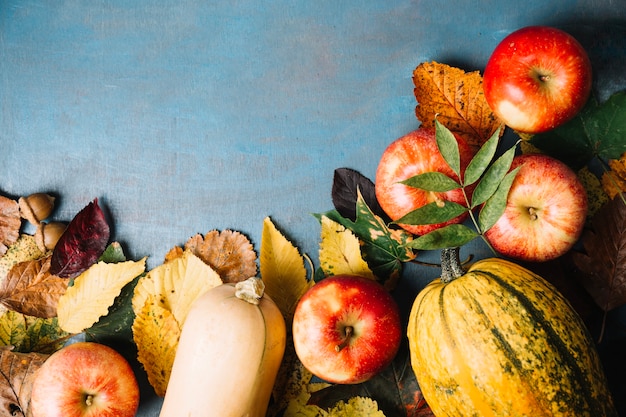 Harvest and fall leaves in arrangement