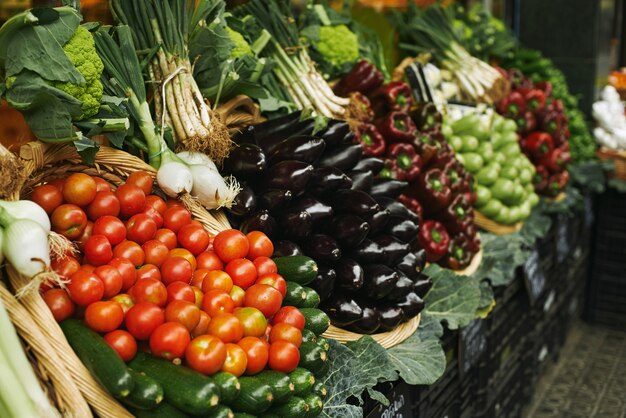 Harvest of fresh vegetable in baskets presented outdoor on market for sale