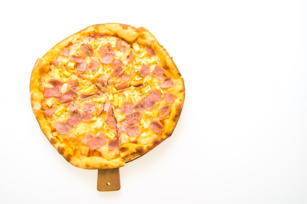 Hawaiian pizza on wooden tray