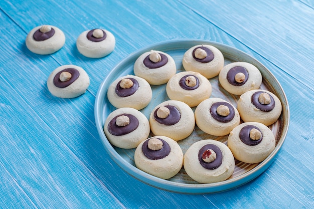 Free photo hazelnut cookies with hazelnuts,top view