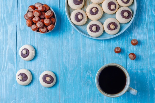 Free photo hazelnut cookies with hazelnuts,top view