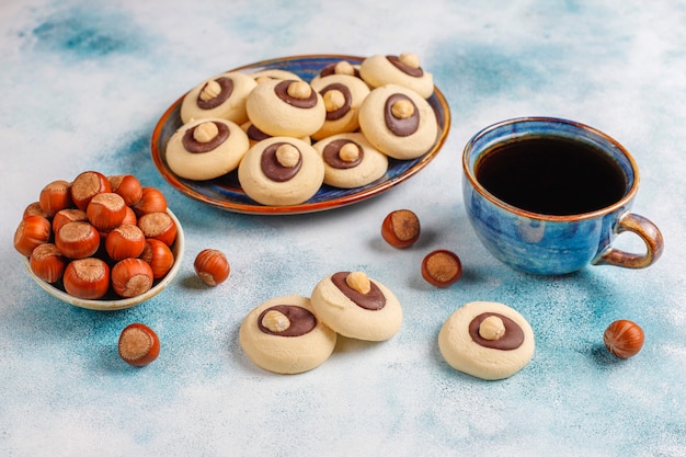 Free photo hazelnut cookies with hazelnuts,top view