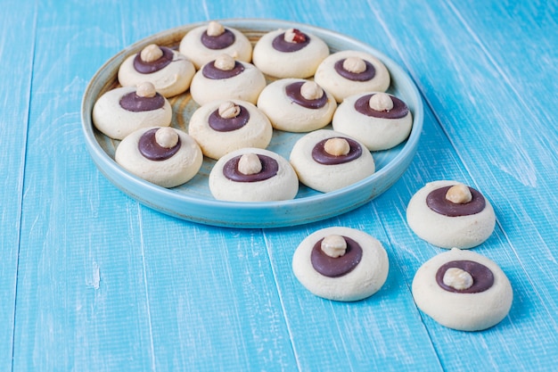 Free photo hazelnut cookies with hazelnuts,top view