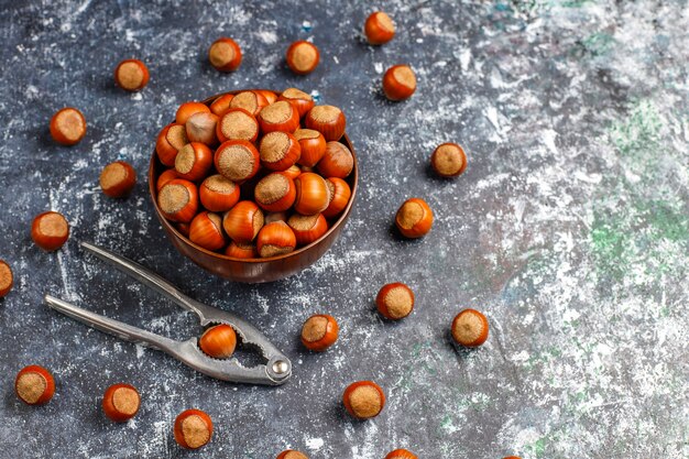 Hazelnuts on concrete background