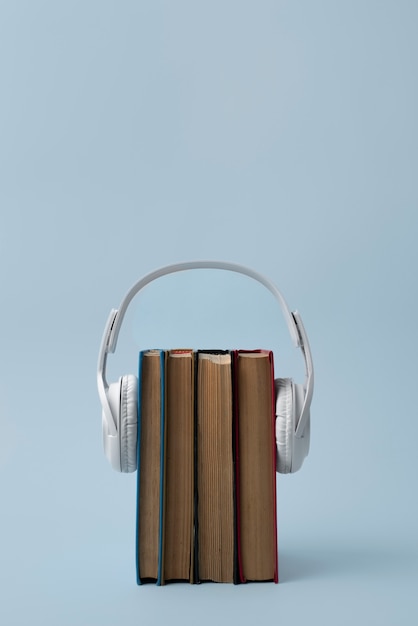 Free photo headphones and books arrangement