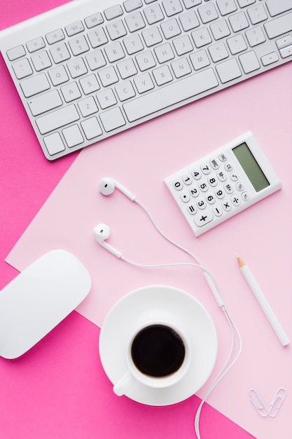 Headphones and coffee beverage flat lay