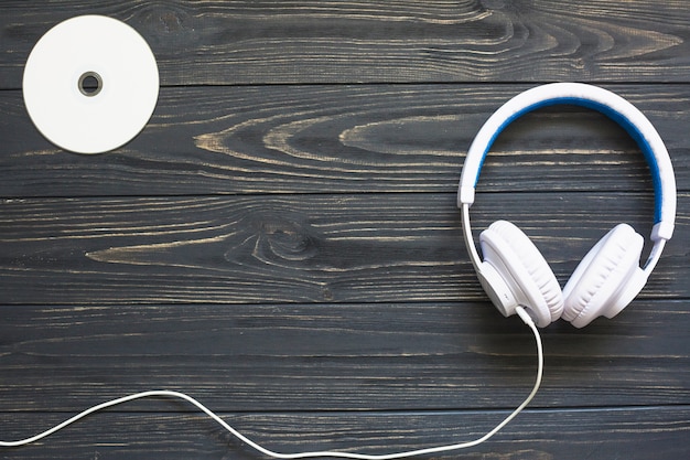 Headphones with disk on table