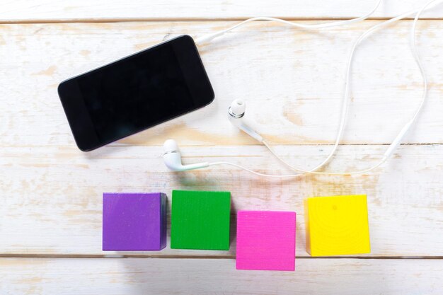 Headphones on wooden desk table