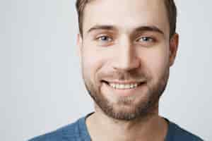 Free photo headshot of smiling happy man with white teeth