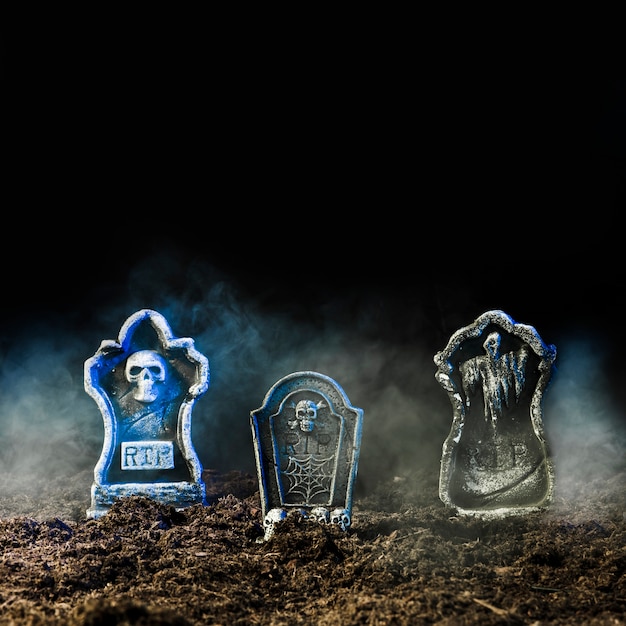 Free photo headstones in fog on soil