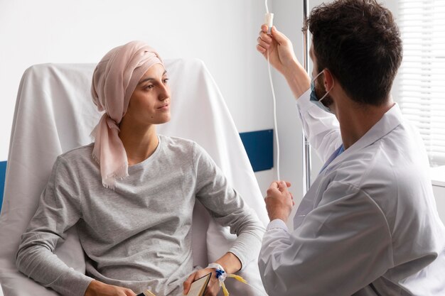 health assistant taking care of a female patient
