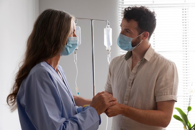 Health assistant with female patient