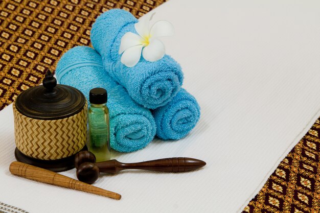 Health spa with white flower ,bottles with essential oil