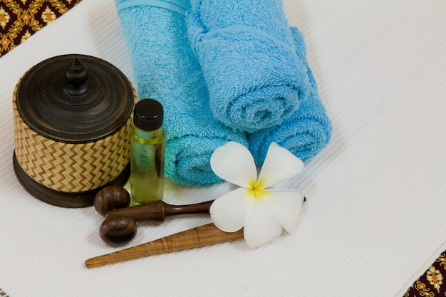 Health spa with white flower ,bottles with essential oil