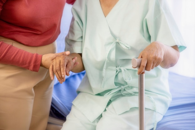 Healthcare concept.daughter caring about elderly mother in the hospital.