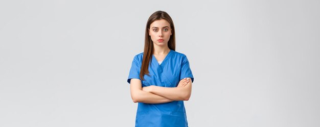 Healthcare workers prevent virus insurance and medicine concept serious and confident female nurse i