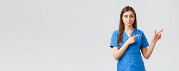 Healthcare workers prevent virus insurance and medicine concept young nurse or doctor in blue scrubs