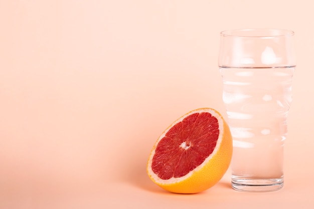 Healthy arrangement with water and fruit