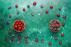 Foto gratuita frutti secchi assortimento sano, vista dall'alto