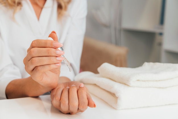 Healthy beautiful manicure and towels