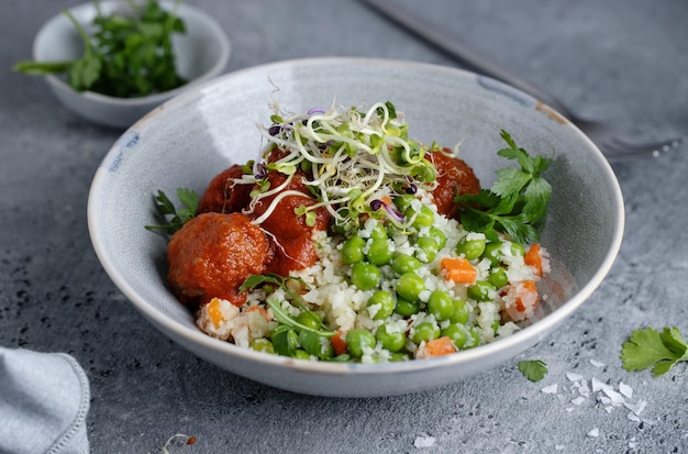 Healthy bowl with meatballs and vegetables