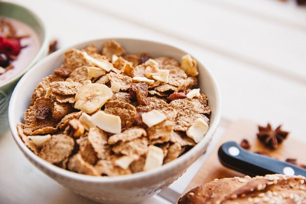 Healthy breakfast concept with bowl of cereals