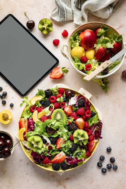 Healthy breakfast and device screen flat lay