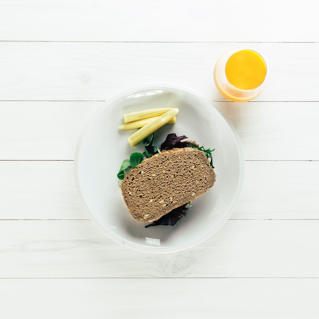 Healthy food composition with bread and orange juice