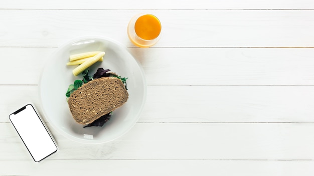 Healthy food composition with bread and orange juice