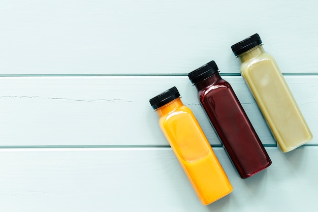 Healthy food concept with juices and copyspace