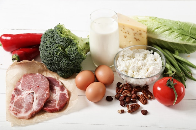 Healthy food ingredients on white wooden table