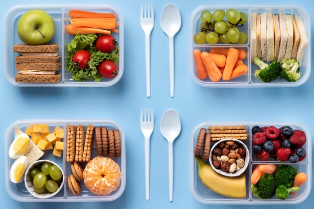 Healthy food lunch boxes arrangement flat lay