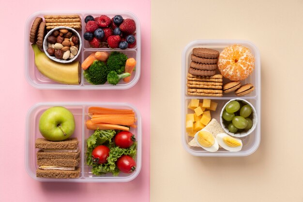 Healthy food lunch boxes arrangement above view