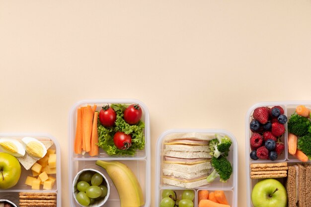 Healthy food lunch boxes arrangement with copy space