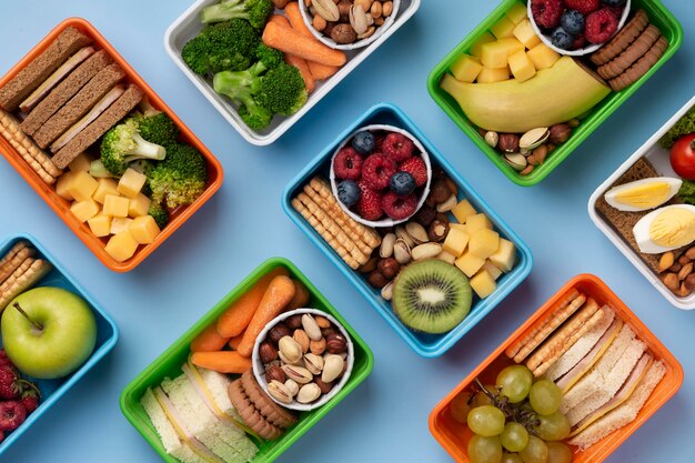 Healthy food lunch boxes assortment top view