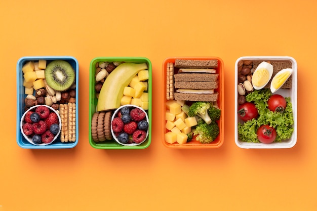 Free photo healthy food lunch boxes flat lay