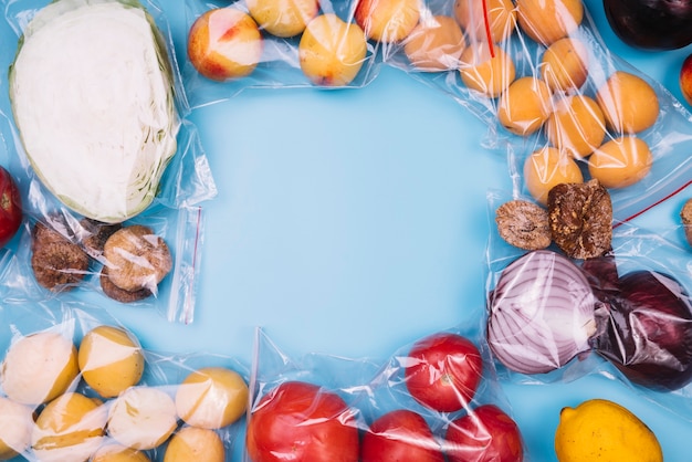 Free photo healthy food in plastic bags with copy space